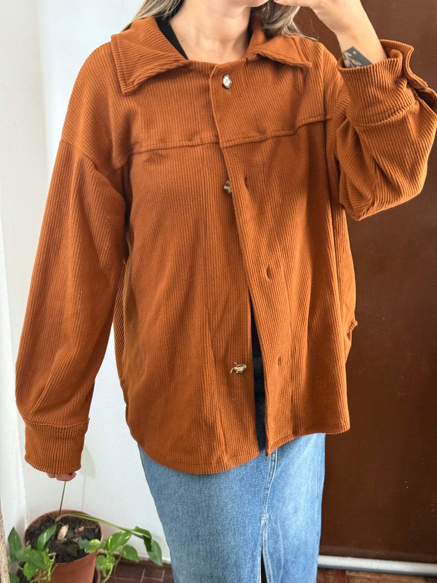 Campera terracota (le falta un botón) talle M