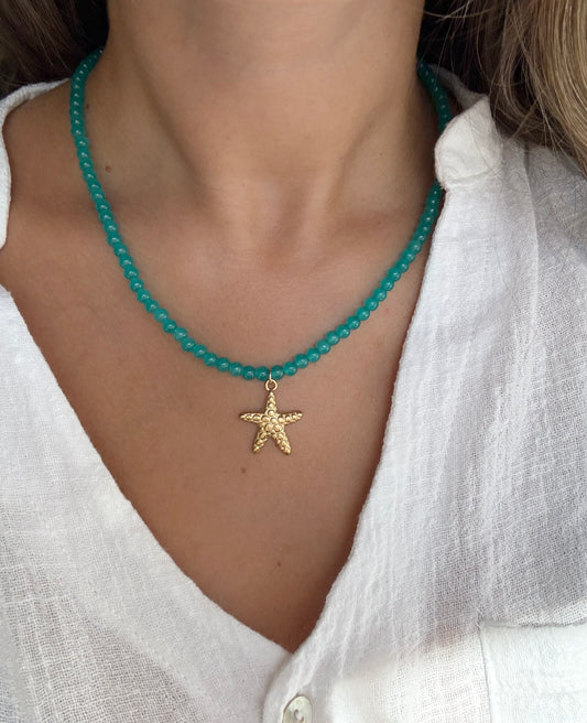 Collar estrella acero dorado