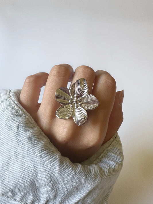 Anillo flor acero regulable