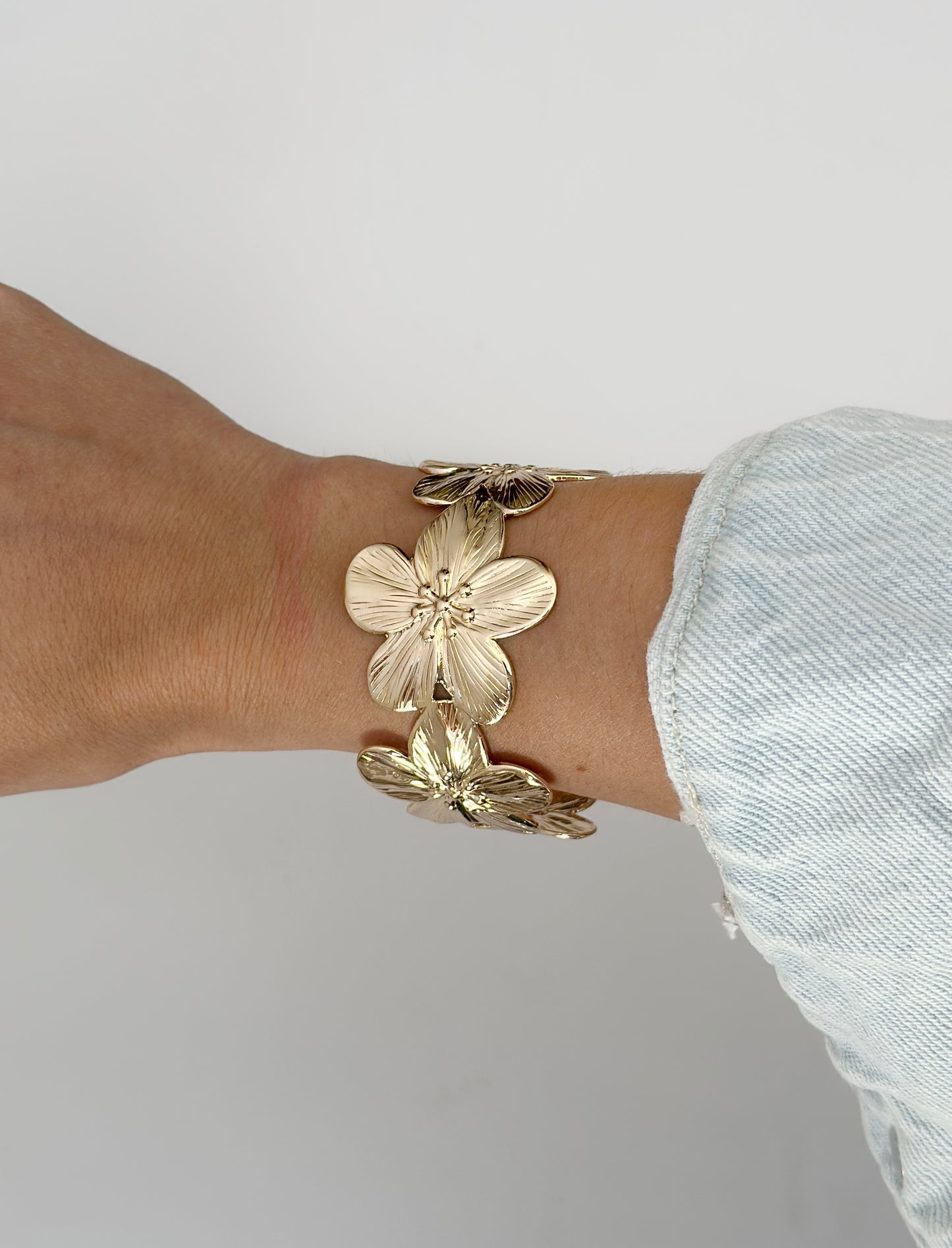 Pulsera flor regulable acero dorado